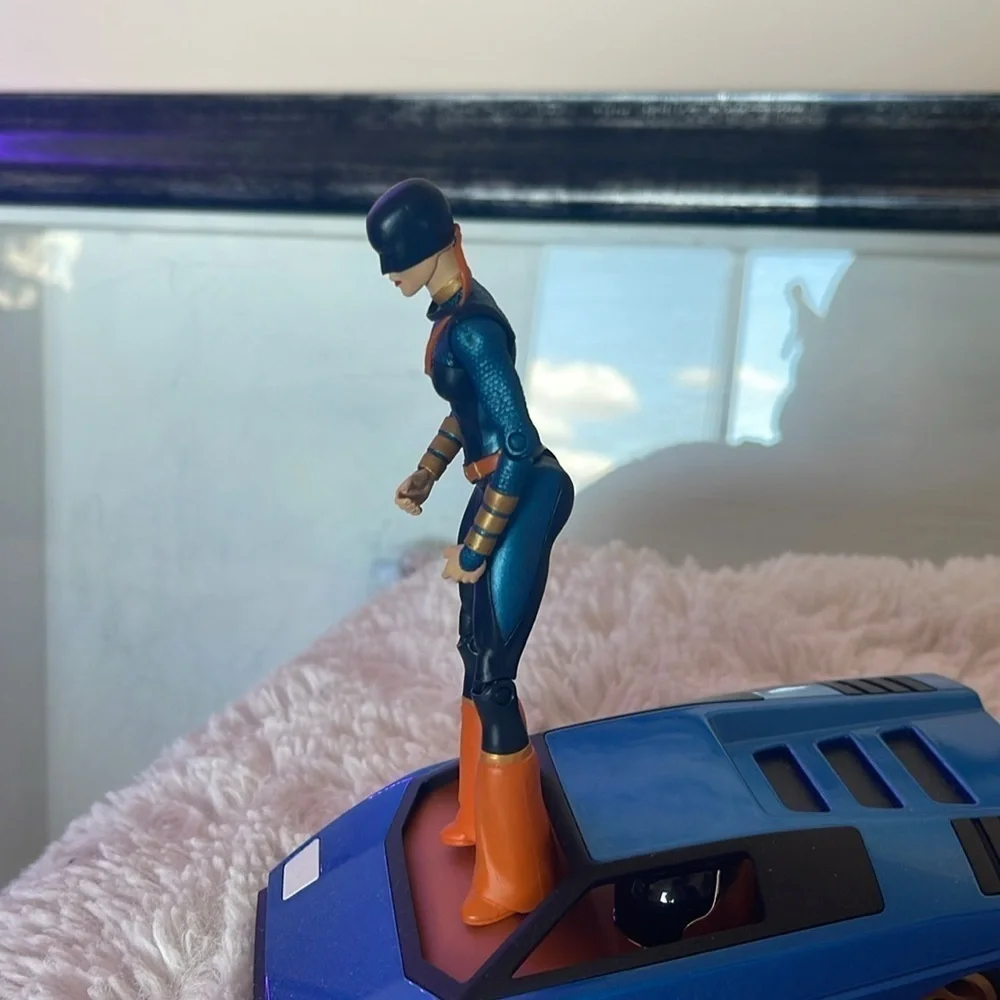 Action Figure with Orange and Blue Costume